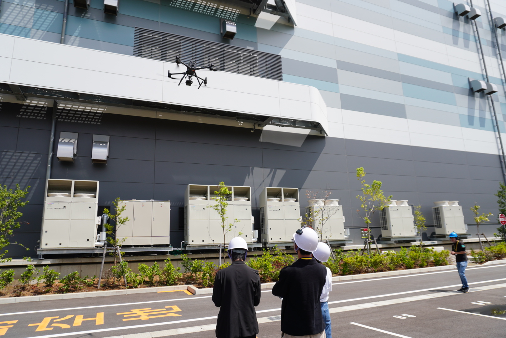 産業機による外壁点検飛行